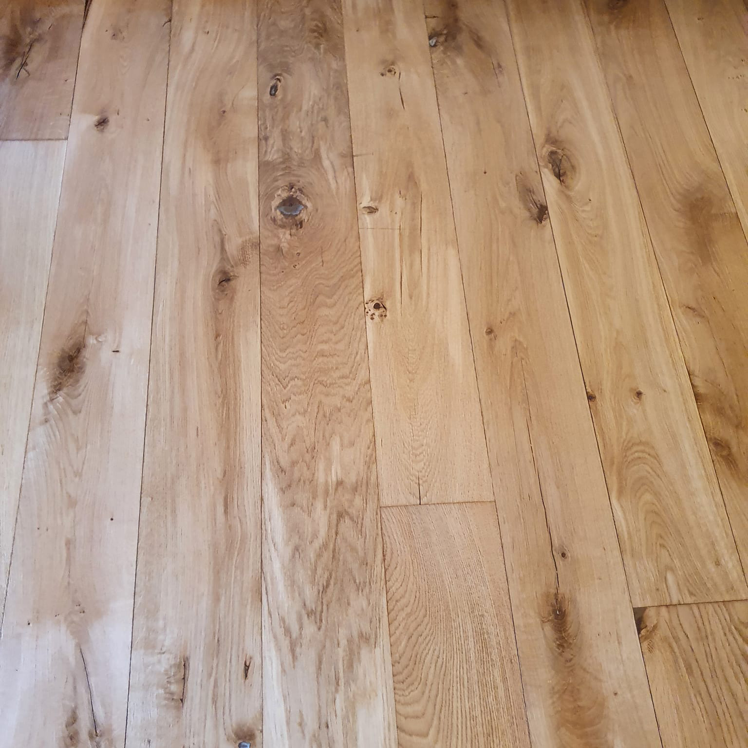 Hard wood floor that has been sanded and polished